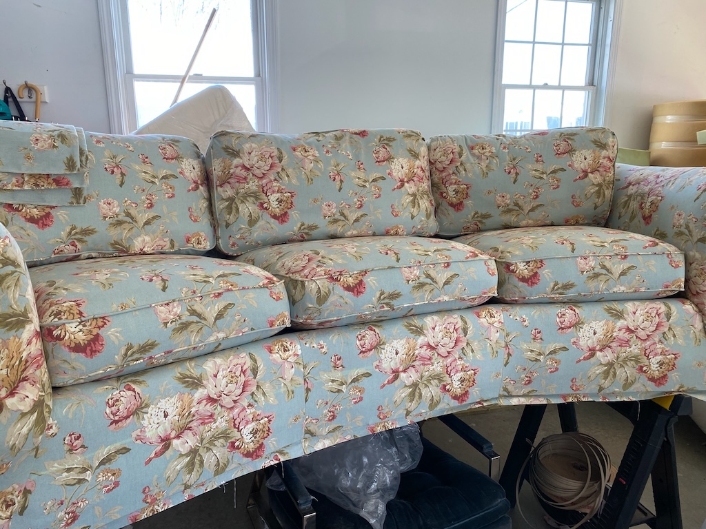 Sofa with soft floral upholstery